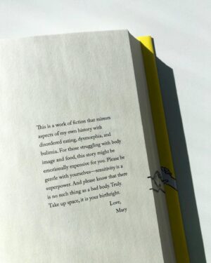 Mary H.K. Choi Instagram - Hi friends, just wanted to share the first page of Yolk. Today marks the beginning of Eating Disorder Awareness Week in the U.S. If you know me, chances are you'll know that bulimia, binge-eating and body obsession are part of my story. I was hoping this letter would serve as a trigger warning but also a reminder. You are not alone and you are not the sum of your compulsions, your traumas or the life-saving tools that are broken but kept you protected at different times. Trust bodies. They are unfathomably wise and doing their best. All my love. 
💛💛💛

[Image caption: The first page of the book, Yolk, that reads, This is a work of fiction that mirrors aspects of my own history with disordered eating, dysmorphia, and bulimia. For those struggling with body image and food, this story might be emotionally expensive for you. Please be gentle with yourselves—sensitivity is a superpower. And please know that there is no such thing as a bad body. Truly. Take up space, it is your birthright. Love, Mary.]