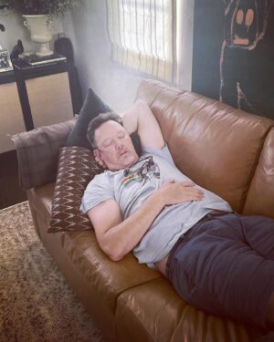 Matthew Lillard Instagram - Found this on my phone… my son is a monster. #dadsleeping a series. (need a longer couch). (Apparently I sleep in flip-flops?) @beadleandgrimms