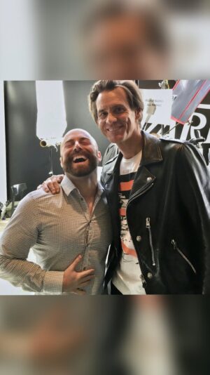 Matthew Santoro Instagram - Remember that time I met Jim Carrey? This was 20 years in the making. Ever since I was a young kid one of my greatest inspirations had been Jim. To this day I can still recite the entire “snowflake the dolphin” scene from Ace Venture.
He is, in every sense, an enlightened human being. I remember that day every other celebrity I met during TIFF (Toronto International Film Festival) allowed their publicist and others to rush them through the promotional circuit of interviews, but when they tried that with Jim, he stopped everyone in the room, told them to be present, relax, and be more human. The entire energy of the room changed. That’s when Jim approached me. As I shook his hand he looked at me as if he recognized me and asked “are you online or something?”. Immediately after, he told me he’s seen my videos before. I was completely taken aback when he said that but, oddly, I wasn’t star struck. Instead I had a real conversation with Jim about how his viral commencement speech talking about “how you can fail what you don’t want, so you might as well take a chance at chance on doing what you love” inspired me.  I told him how used to be an accountant like his father but instead of taking the conservative approach like he did, I took that risk and today I am a full time YouTuber. I thanked him for using his influence to make the world a better place in a time when it’s fashionable to be controversial for attention. After making me laugh about 20 times we took this picture and parted ways.
That was a moment in my life I’ll never forget.