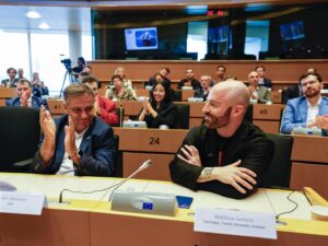 Matthew Santoro Instagram - On my final day here in Brussels I was honoured to give a brief talk in the EU Parliament. Surrounded by distinguished guests, politicians and leaders of industry I discussed how creators like myself have the ability, and in many ways responsibility, to leverage our platforms and followings to raise awareness (and when possible, funds) for important causes. One such cause was the launch of the European Cancer Community Foundation today, which aims to eliminate inequalities in cancer care and funding. Cancer is a disease will affect all of us at some point either directly or indirectly. I’ve lost family members from this horrible disease and had friends affected by it, which is why it’s close to my heart. I couldn’t be more proud to be a part of this initiative. My community and I have already raised tens of thousands for charity this year, including the Canadian Cancer Society, the Breast Cancer Research Foundation, and soon our efforts will expand overseas to Europe! As the foundation says, let’s do better together! (If you’re interested in supporting this amazing initiative, check out the link in my bio!) #europe #europetravel #belgium #cancer #cancerresearch #charity #charityevent #travel #travelling