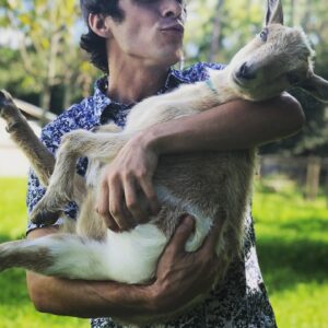 Matthew Underwood Instagram - A tiny goat.

A tiny goat who gives zero f***s about my kisses. #GoatsOfInstagram #KidGoat #Farmlife #SassyGoat #MatthewUnderwood #GiveMeKissesRightNowYouLittleRascal