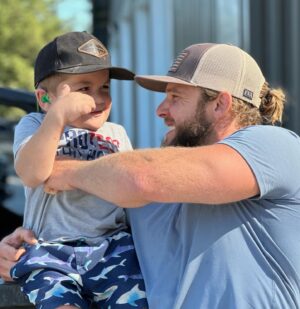Max Thieriot Instagram - Father’s Day 2023 was incredibly special and a day I will always cherish. A perfect day of four wheelin and swimming with family and my friend here, Jett. At 5 years old he is so much stronger and far more courageous than I can even fathom. Shortly after birth, Jett was diagnosed with MPS 1 (hurler syndrome). He has gone through chemotherapy, bone marrow transplants, countless other surgeries, but through all of it has shown what it truly means to be a fighter. Even though he was still recovering from a recent surgery and unable to show me how he rides his dirt bike, his infectious laugh and amazing smile never ceased. Thanks for showing me what a real “fighter Jett” looks like buddy! Next time we will ride dirt bikes but then I think you need to ride in a fire engine! 🙏❤️ #mps1 #hurlersyndrome #findacure #fighterjett
