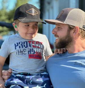 Max Thieriot Instagram - Father’s Day 2023 was incredibly special and a day I will always cherish. A perfect day of four wheelin and swimming with family and my friend here, Jett. At 5 years old he is so much stronger and far more courageous than I can even fathom. Shortly after birth, Jett was diagnosed with MPS 1 (hurler syndrome). He has gone through chemotherapy, bone marrow transplants, countless other surgeries, but through all of it has shown what it truly means to be a fighter. Even though he was still recovering from a recent surgery and unable to show me how he rides his dirt bike, his infectious laugh and amazing smile never ceased. Thanks for showing me what a real “fighter Jett” looks like buddy! Next time we will ride dirt bikes but then I think you need to ride in a fire engine! 🙏❤️ #mps1 #hurlersyndrome #findacure #fighterjett