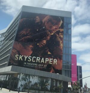 McKenna Roberts Instagram - Happy Friday! Two weeks till the release of #Skyscraper On July 13th. The Sky is the Limit🔥 If you are cruising down Sunset Blvd in LA, or near Times Square in NY take a photo and tag me 💗 Thank you to the sweet @kaymais for snappin this photo Xoxo ♥️ M’ #skyscrapermovie