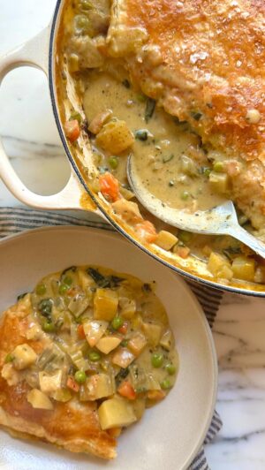 Megan Mitchell Instagram - A vegetable pot pie that isn’t lacking in flavor or texture. Mine is packed full of delicious organic veggies from @CalOrganicFarms like carrots, celery, chard, potatoes and parsnips. The ideal cozy #onepotmeal to warm you up on these chilly winter nights. #ad Recipe👇🏼⁣
⁣
Ingredients:⁣
• 1/4 cup unsalted butter⁣
• EVOO, for drizzling⁣
• 5 green onions, thinly sliced ⁣
• 4 carrots, scrubbed clean, cut into 1/2-inch pieces ⁣
• 3 celery stalks, cut into 1/2-inch pieces⁣
• 2 medium parsnips, scrubbed clean, cut into 1/2-inch pieces⁣
• Kosher salt and black pepper,  to taste⁣
• 2 garlic cloves, minced⁣
• 1 tbsp. each minced thyme and rosemary ⁣
• 1/4 cup AP flour⁣
• 3 cups vegetable broth⁣
• 1 small bunch green chard, washed and roughly chopped⁣
• 5 Yukon gold potatoes, peeled and cut into 1/2-inch pieces⁣
• 3/4 cup heavy cream ⁣
• 1 cup frozen peas⁣
• 1 sheet puff pastry, defrosted ⁣
• 1 egg, lightly beaten ⁣
• Flaked sea salt, for topping⁣
⁣
Directions:⁣
• Preheat oven to 400F⁣
• Bring a large 12-inch low braiser up to heat over medium. Melt in the butter and 1-2 tbsp. of EVOO. Add in onions, carrots, celery and parsnips. Sauté for 10 minutes stirring often. Season with salt and pepper⁣
• Add in the garlic, thyme and rosemary. Cook for 2 minutes or until fragrant. Next add in the flour and cook about 2 minutes. If the skillet looks too dry add in 1-2 tbsp. of EVOO as needed⁣
• Turn heat to low, add in the stock and stir, followed by the chard, potatoes and heavy cream. Remove from heat and stir in the peas. Taste for seasoning⁣
• Unfold the pastry and roll out any creases. Place on top of the mixture, it won’t reach the sides but that’s okay. Brush with the beaten egg then sprinkle with flaked salt⁣
• Bake for 25-30 minutes or until the crust is golden brown, puffed and the mixture is bubbling⁣