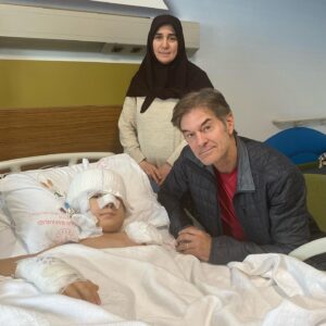 Mehmet Oz Instagram - I visited the pediatric ward in Adana, which has already performed almost 1000 limb amputations, including one for 12 year old Semih Bilgili. His father was pulling him to safety when a beam fell, severing his arm and killing his father. I met with Semih and his mother, Zeliha. Semih’s main request was a soccer ball—it’s a major breakthrough for an amputee to want to be active again!