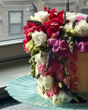 Mehreen Karim Instagram - midsummer’s dream cake for rima 🌹fresh raspberry cake, strawberry mascarpone cream, fresno chili raspberry jam, whipped white chocolate ganache. vivid, elegant, and spicy just like @rimvmivh 

glimpse of some BTS including my brainstorm/vision that didn’t fully come to life thanks to a heat wave and the fact that decorating a cake without buttercream is so hard for me lol
