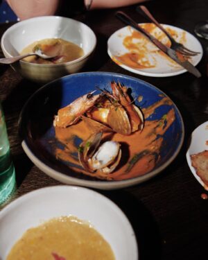 Mehreen Karim Instagram - the finale ❤️ cardamom parisian flan and brûléed figs, dimer aloo chop (spiced potato encased and fried soft boiled egg)   cilantro raisin chutney, grilled prawns and jhal (spicy) seafood curry, creamed corn bhorta, green tomato, melon, fluke crudo marinaded in a green chili, lime, coconut sauce. this was one thousand percent my favorite menu. i hope you tasted every ounce of love and home I brought to this dinner. thank you ❤️ 

📸 @isa.zapata