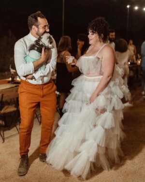 Melanie Field Instagram - #OTMBride @melanie__field and Zachary Likins first matched on @bumble. 🐝 A year and four months later, he proposed while on a trip to see her family in Philadelphia. 💍 Once engaged, the couple agreed they wanted to share their love of the desert 🏜️ with their friends and family and get married in Joshua Tree. 
⠀⠀⠀⠀⠀⠀⠀⠀⠀
For the ceremony, Mel aimed to wear something unique. “I wanted to look and feel regal like a princess but from another universe,” the bride says of her wedding dress vision.🪐🛸💙👑 “And I knew I wanted tulle and lots of it, so I could just plop down on the ground in a pile of tulle. 
⠀⠀⠀⠀⠀⠀⠀⠀⠀
The bride found @millia.London and the label’s designer, Ruth, made her dream come to fruition. “As a plus size woman, I’ve spent most of my life feeling very excluded from high fashion. My experience with Millia London was not only lovely but healing in many ways,” Mel shares. “I didn’t have to settle on my special day, and I one-hundred percent felt like the wormhole space princess who fell from the sky—just like I dreamed I would.” 👰🏻‍♀️

#OTMWeddings #OTMExclusive #DesertWedding #CaliforniaWedding
⠀⠀⠀⠀⠀⠀⠀⠀⠀
📷: @wearemattandjess
Planning: @yuandus
Beauty: @angiebulmer @dear_shears
💐: @desertrose.creative
Catering: @mojavedesertcharcuteriecompany @sohotaco
🎶: @whosjondoe
🍰: @picnicbakedgoods