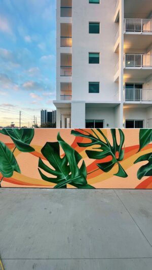 Melanie Posner Instagram - Don’t mind me channeling my inner Disney Channel but an actual dream that I get to paint these tropical walls back in the city that I love. These are the first 2 out of 10 on this side of the building (👀😏) I’ll be transforming for a new boutique hotel opening in downtown St. Pete ✨
.
.
.
.
.
#stpeteart #stpeteartist #dtsp #womenwhopaint #muralist #muralpainting #tropicalart #plantpainting #muralartist #vibrantart #femaleartists #sandiegoartist #sandiegoart #floridalife #stpetemurals