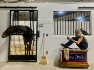 Melissa Moore Instagram - Waiting for the rain to stop! Arrowheads Phenomenal and me just hanging out !!! @ocalainternationalhorseshow @melissamoore27 @sunrisestables27 #horseshowlife #equinelife #rainraingoaway #blessed #farmgirl #horsegirl #mothernature #patience #ocalainternationalhorseshow #freedmanstestteam @freedmanharness photo@was taken by my client and friend @helena.moreno.56 while we were  for her class