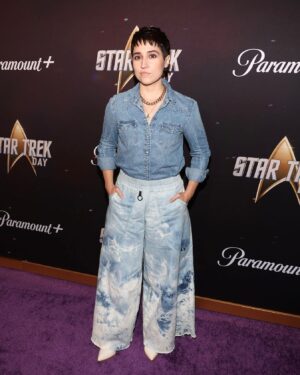 Melissa Navia Instagram - Space cowboy country blues on the purple #StarTrekDay carpet. A wish to one day ride into a western and a nod to my Brian’s “Irish Cowboy Country Blues” album. (And also a denim tuxedo, so a shout-out to 🇨🇦 where we film.)
•
•
Styling by @paulinacastrostyle
Makeup by @tracyraffelsonmakeup
Hair by @alexhenrichs
Shirt by Levi’s
Pants by Son-Ya
Boots by Nine West
Necklace by Alexa Leigh
•
•
#StarTrek #StrangeNewWorlds #ForBrian #LLAP @startrek @startrekonpplus @paramountplus @cbstvstudios @paramountplusuk @paramountplusla @paramountplusbr