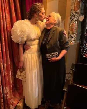 Micaela Diamond Instagram - my heart has grown so many sizes!! here’s me with my heroes. happy opening to my dear company of @paradebway. 

styled by @jakesokoloff 
dress: @_aje_ 
earrings: @ettika 
shoes: @dolcevita 
mother: @mamakdiamond