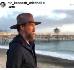 Michael Beach Instagram - I love Kenny Mitchell❤️

He passed away yesterday💔

I tried to make a video to acknowledge his life and his GREATNESS as a man/human of EXCEPTIONAL CHARACTER but I couldn’t get through it without breaking down. And this post is not about my sadness but about his strength and his family’s unbelievable courage and love. His wife Susan. His daughter Lilah. His son Kallum. 

Kenny was diagnosed with ALS over 5 and half years ago. Of course, I didn’t experience the heartbreaking moments he and his family went through but I did witness many of the joyful, grateful times they shared/we shared for life and family during my visits to their home. Much of my time with them was as they dealt with the different awful stages of ALS. But Kenny remained a powerhouse of positivity and humor. He constantly reminded me how much taller he was than me even after he was confined to his fancy chair - even after he lost the ability to speak he had a computer that operated through his breath and when that ability left him he used his eyes to type out his jokes. He would even text me out of the blue to remind me to stand on my “Apple Box” next to tall people on set (at work) so I could appear more manly 😁🤣.

He would also text me to tell me that he loved me - like he did 2 days ago ❤️💔

He was a gift in my life and showed me to ALWAYS appreciate and enjoy each day - each moment. Go to his page and see him for yourself. @mr_kenneth_mitchell 

I love you, you “tall bastard”! ❤️