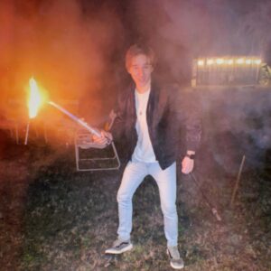 Michael Campion Instagram - there’s absolutely nothing to post, so heres a picture of me, holding a flaming light saber