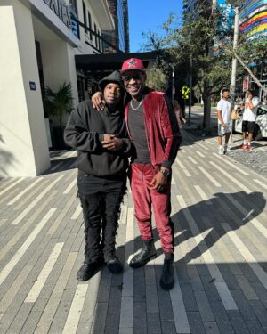 Michael Irvin Instagram - Back home having lunch with my son Elijah. aka ⁦‪@TutTarantino‬⁩ HE NEVER SMILES in pics and I always told him as DaD I will take my kisses until God takes me from time to eternity. 🙏🏿❤️😂