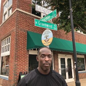 Michael Kenneth Williams Instagram - I went to Tulsa in August 2019 to work on @bodybrokersfilm at the same time I was working on Lovecraft County.
I went to the community where our Ancestors used to live and all that was left were the stairs to the homes that used to be there.
I then went and stood on the intersection of Greenwood Avenue and Archer Street AKA Black Wall Street which stretched all the way to Pine Street, it was there I met @riccowright03 A fourth generation Tulsan and he owns an art gallery called @bws.gallery 
We played chess and listened to music as we spoke about our Ancestors, our legacy and our community.
I met a brother and made a friend that day🖤.
#forgivedontforget