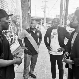 Michael Kenneth Williams Instagram - I went to Tulsa in August 2019 to work on @bodybrokersfilm at the same time I was working on Lovecraft County.
I went to the community where our Ancestors used to live and all that was left were the stairs to the homes that used to be there.
I then went and stood on the intersection of Greenwood Avenue and Archer Street AKA Black Wall Street which stretched all the way to Pine Street, it was there I met @riccowright03 A fourth generation Tulsan and he owns an art gallery called @bws.gallery 
We played chess and listened to music as we spoke about our Ancestors, our legacy and our community.
I met a brother and made a friend that day🖤.
#forgivedontforget