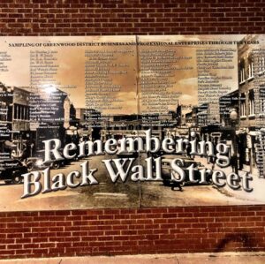 Michael Kenneth Williams Instagram - I went to Tulsa in August 2019 to work on @bodybrokersfilm at the same time I was working on Lovecraft County.
I went to the community where our Ancestors used to live and all that was left were the stairs to the homes that used to be there.
I then went and stood on the intersection of Greenwood Avenue and Archer Street AKA Black Wall Street which stretched all the way to Pine Street, it was there I met @riccowright03 A fourth generation Tulsan and he owns an art gallery called @bws.gallery 
We played chess and listened to music as we spoke about our Ancestors, our legacy and our community.
I met a brother and made a friend that day🖤.
#forgivedontforget