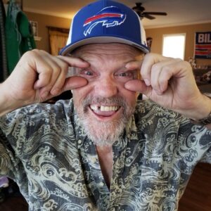 Michael Rooker Instagram - Check out my new hat. Even my eyes are smiling because I’m the newest member of the #BillsMafia Go Bills!!! (All of this is @j_terzieff s fault)