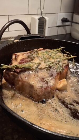 Michael Symon Instagram - GOD I LOVE STEAK!… this was so delicious and the key ingredient is patience… believe it or not this was a choice steak but the technique we used here made it irresistibly delicious… happy cooking everyone… full recipe below! 🥩⏲️

CAST IRON HERB BUTTER-BASTED STRIP STEAK
Serves 2

1 8-10 oz strip steak
¼ stick butter
2 cloves garlic, crushed
2 branches each rosemary and thyme
2 tbl EVOO
S & P to taste

Salt and pepper the strip the night before and leave uncovered in the refrigerator.
30 minutes before cooking, bring the meat to room temperature.
Heat a 10” cast iron pan on medium/ high heat until it begins to smoke.
Lightly oil the steak on both sides, place in the hot pan. Do not move the steak for 3-5 minutes.
Flip steak when bottom is nicely browned. If you have one, use a weight to assist with an even sear. 
Add ¼  to ½ stick of butter, crushed garlic, and fresh herbs to the pan. Allow to saute for 1 minute, then begin to baste the steak for approx. 2-3 minutes.
Add a tablespoon of compound butter to the top of the steak and allow rest for 5-10 minutes.
Slice the steak and top with compound butter, salt, pepper, and a drizzle of EVOO. 

For Compound Butter
2 sticks room temperature butter
1 clove grated garlic
2 tablespoon Kosher salt
2 dash worcestershire sauce
2 dash red wine vinegar
1 anchovy smashed
2 tablespoons flat leaf parsley 

Mash the 2 sticks of butter with the grated garlic.
Add salt, (pepper if desired), worcestershire, red wine vinegar, anchovy, and parsley.
Mix all together, (at this point you can add any other of your favorite ingredients).
Compound butter can be made in advance and will store in the refrigerator for a week, bring to room temp before using.