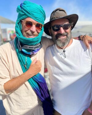 Michaela Watkins Instagram - Just got back from @burningman. Haven’t caught up with what Chris Rock said- and I don’t care. Why? Because as it was suggested by a good friend, taking pot shots and men of color for joking wanting a coffee or something is pretty lame. Let’s not even go there, folks. Let’s just not. 

As far as @burningman, we had a damn blast and I honestly don’t know why we made any headlines. The actual headline should’ve said “it rained at burning man and it made it hard to ride a bike for a day”. Yes I’m being cheeky here, but I do wish the community care and kindness and humanity that kept everyone rolling and their spirits up translated to our real world. These 80k people are resilient as hell. My fav is watching people slipping around in the mud as they went to check on others while laughing their ass off. No this was not fyre fest. It was a community of capable loving folks with way too much shit making sure everyone was all set for the day. 

Just like the real world, BM is an amalgamation of the best and ugly things humans have to offer. Much I could do without but some of it makes this place truly the most mystifying thing I’ve seen. Holding both at the same time is the struggle. 

Anyway, here are some pics of us being accidentally adorable. More to come when I upload my husbands phone at some point this year…