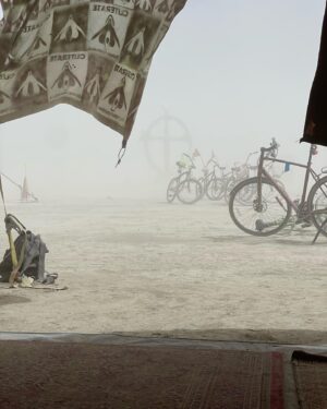 Michaela Watkins Instagram - Just got back from @burningman. Haven’t caught up with what Chris Rock said- and I don’t care. Why? Because as it was suggested by a good friend, taking pot shots and men of color for joking wanting a coffee or something is pretty lame. Let’s not even go there, folks. Let’s just not. 

As far as @burningman, we had a damn blast and I honestly don’t know why we made any headlines. The actual headline should’ve said “it rained at burning man and it made it hard to ride a bike for a day”. Yes I’m being cheeky here, but I do wish the community care and kindness and humanity that kept everyone rolling and their spirits up translated to our real world. These 80k people are resilient as hell. My fav is watching people slipping around in the mud as they went to check on others while laughing their ass off. No this was not fyre fest. It was a community of capable loving folks with way too much shit making sure everyone was all set for the day. 

Just like the real world, BM is an amalgamation of the best and ugly things humans have to offer. Much I could do without but some of it makes this place truly the most mystifying thing I’ve seen. Holding both at the same time is the struggle. 

Anyway, here are some pics of us being accidentally adorable. More to come when I upload my husbands phone at some point this year…