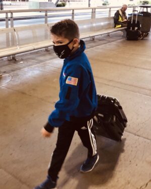 Michelle Clunie Instagram - I told Dashiell, “ Grandma needs us to come visit but we have to be very careful, especially at the airport. We do not stop for snacks or take our masks off. We just go right to the plane. We can not get this virus. Think of it like we are on a mission”. So here is Dashiell on a mission to go see his Grandma because he loves her so. My little man on a mission. I am so proud of him and  he even managed to look tough in his kitty cat mask. Mama loves you my sweet brave boy 💕🙏🏻💕