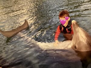 Michelle Clunie Instagram - It just slays me that Dashiell is so cool swimming with these beautiful beasts. Yes they are graceful and poised but when you swim next to them you feel the sheer strength of their movement. It can be intimidating. But this is his happy place. He has swam with this Dolphin before. I think the first time he was a year old, the first time he was in the water with him. This was from our last trip to O’ahu over Thanksgiving. 💕💕💕Keep dreaming of a clean ocean my Boyfish. The world needs more people like you 💕💕💕 #futuremarinebiologist