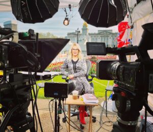 Michelle Dewberry Instagram - Day two at the Palace done! Sun shone, but boy it was colder tonight! From me, my Britney Spears mic and my red boots, it’s goodbye from me & see you same time tomorrow…
.
.
If you missed the show, check it out here: https://www.youtube.com/watch?v=urQ3_2EYxs8
.
.
#DewbsAndCo #BuckinghamPalace #CoronationWeek #KingCharles #TVPresenter #LiveTV #Debate