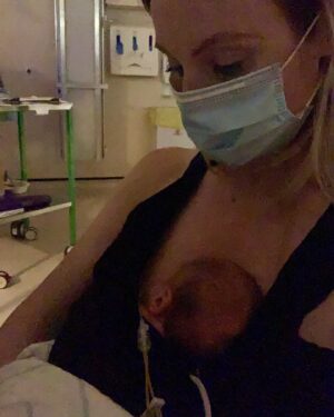 Michelle Dewberry Instagram - Still in hospital and this is how I spend much of my time now, giving my boy “skin-to-skin” (aka “kangaroo care”). 🦘 
.
.
It has great health benefits for premature babies and it’s one of the best ways for parents & premmies to bond. 
.
.
It also happens to be one of my favorite things-we sit like this for hours and hours ❤️👶🏻
.
.
Further info on this method of premmie care can be found here: https://www.tommys.org/pregnancy-information/pregnancy-complications/premature-birth/your-babys-time-hospital/kangaroo-care
.
.
(Btw, rubbish photo quality because it’s quite dark in here)
.
.
.
#preemiebaby #preemie #preemie #preemiepower #kangaroocare #skintoskin #prembaby #prematurebaby #nicumama #nicufamily #nicuwarrior #niculife #nicu #neonatal #pprom #ppromawareness #strongbaby #fighter #motherslove #blessed #gratitude #loved #strength #motherandson #pregnancyjourney #pregnancycomplications
