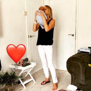Michelle Dewberry Instagram - One shoe on. One shoe off. Nappies on the floor, a whirlwind of mess around me (you should see the chaos that is just out of shot 🤦🏼‍♀️😂) and my son just about to throw up in my face - but, a whole lot of love... This picture sums up my life right now 😂😂
.
.
This is us adjusting to each other and figuring things out, one day at a time. 
.
.
If you’re one of those first time mums who manages to get out of the door looking glamorous every day, I salute you 🙌🏻 If however, you’re more like me and desperately tying to figure out how to somehow get organised, while trying to function on about 2 hours sleep per day and considering it a success if you even manage to get out of the door - that’s ok too (I think! 😂🤣)
.
.
.
#motherhood #firsttimemum #myboy #love #adjustment #disorganisedchaos #tired #newchapterbegins #mumtoboys #newmum #parentlife #mumlife
