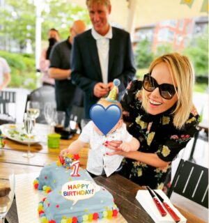 Michelle Dewberry Instagram - And just like that, our little, much loved peanut head turned ‘1’. 👶🏻❤️☺️. He’s a beautiful, fun baby and the most inquisitive/curious little boy I’ve ever met. Nothing (and I mean nothing!) gets past him without a thorough investigation first 🤣
.
.
In my head, he’s not really 1 tho. He was born over 2 months prematurely so saying he’s one almost makes me feel a bit cheated out of his first year. So yes, he’s 1 on paper, but 10months old to us. (Once he gets past his first year from his due date, I guess it matters less but for now, to me, he’s 10 months). Any other preemie parents know what I mean? 
.
.
For his birthday, we kept things simple - I don’t like to spoil my son so we didn’t get him a single gift (poor kid 🤣🤦🏼‍♀️) and we kept things simple again with a gathering of friends at a local pub. It was so lovely to see everyone and bubba did get lots of lovely, kind gifts from friends and family (which I didn’t let him open all on one day but instead spread out over a week! 🤣🤣). I was touched by the effort people made ❤️
.
.
I was gonna do a nice 1st birthday pic Instagram style, but being honest - I couldn’t be bothered 🤣🤦🏼‍♀️ so here we are blowing out the cake candle and with a very untidy, birthday corner. 
.
.
I like to keep my bubba private but I share, as always, to give encouragement and hope to anyone who is currently experiencing PPROM or NICU to try and show you that there is light at the end of the tunnel. Stay strong, you got this xx 
.
.
.
#babyboy #mumandson #1stbirthday #birthdayboy #love #preemie #31weeker #pprom #ppromawareness #nicumama #nicuwarrior #nicu #28weeker