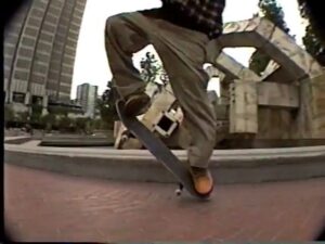 Mike Carroll Instagram - @jovontae_888 in 1992 with Timeless style of everything from the baggy khakis, flannel, tricks, Scooped BS 180’s and the push(even the sw mongo that most of you probably dislike). With the exception of the pressure flips he made look good AND them ugly mustard Airwalks😂that Jovontae notoriously made look ✨proper✨ Only he could make them look good. 
See more footage like this on @aaronemeza cuz he has a lot of clips/footage now up and to come. #EMB4life