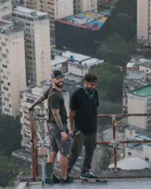 Mike Corey Instagram - Swipe for Rooftopping in Venezuela ➡️ 
Nothing like rust, dust, and sketchy ledges.
I’ve always wanted to try it. I felt rooftopping was an expression of freedom. Solving a puzzle to enter the building, then walking the ledges above a city, feeling like a king for a brief minute before having to find a way back out. Of all all the places this could happen, Happy we could do it with @fpluss1 in Caracas. 

This is Parque Central, the highest skyscraper in Caracas. It’s abandoned from floor 27 all the way to 59 due to a fire. On the top, a glass floor helipad, and the best view in the city.

Love to @vidafuria for hosting us. If you want to come to Venezuela, hit them up.

Photos by @rodrigoungaro