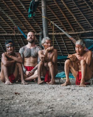 Mike Corey Instagram - FIGHTING SPIRITS WITH YANOMAMI SHAMANS
Every day at 3pm the Yanomami blow Yopo through bamboo into the noses of the shaman. This gray powder is composed of several seeds and leaves from the jungle which contain powerful hallucinogenic effects.

This allows the shaman to see spirits. 
This allows the shaman to fight spirits. 

The Yanomami believe that sickness is all in your mind, and you must battle daily against the bad spirits that try to infect your thoughts. 

I stepped in with the village elders and went to war with my own spirits. But I’ve got to ask my audience….

How much of our sickness is actually in our minds?
Drop your thoughts below.

If you want to visit Venezuela message @vidafuria 🇻🇪
Photos by @rodrigoungaro 📸

#venezuela #amazon #yanomami #tribe