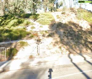 Mike Escamilla Instagram - Things that never got done… while filming for the first @united_bmx caveman edit maybe back in 2017 I came across this set up …the rail was rickety so I had to prop it up with a 2x4 you can see at the top. I also kicked a runway into the dirt to make a path… I think I even glued an angle iron over part of the rail because it had rotted through the metal .. the problem was there were always cars parked in the way. This day we had a clean shot, being about 45 minutes away from my house meant a lot of trips up there only to be a no go cause of cars. I think this was second or third try…. Shortly after maybe even the next try a slipped off getting on and hit my shin on a decaying piece of metal somewhere and punctured it … (see second photo) a quick trip to the hospital to get stitched after that. Which lead to months of coming back only to be met with cars blocking the path… after probably 10 trips to look I finally gave up and put the edit out without it …  this happens not to often where I don’t even get a real attempt at something and it haunts my soul for years … I drove back over there last year and saw the rail had finally rotted away and was removed (see third photo) … does this make me feel better that it’s not there so I couldn’t do it anyways or does it make it worse that now cause I’ll never do  it ? I’m not sure … either way… pretty cool setup .. #bmx #betheadventure
