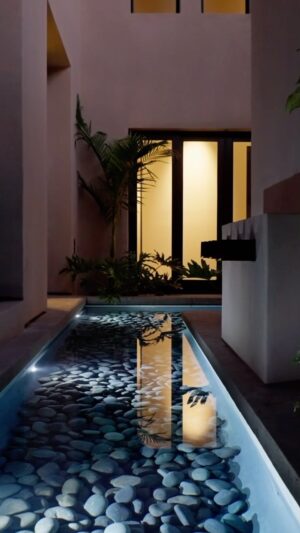 Mike Pyle Instagram - Who else suddenly wants to go for a night swim? 🙌🏻 I love how the light plays off of the water in this design. #MPD #MikePyleDesign #Aesthetic #Design #OutdoorLiving #LandscapeDesign #Landscaping #MorseLandscapes