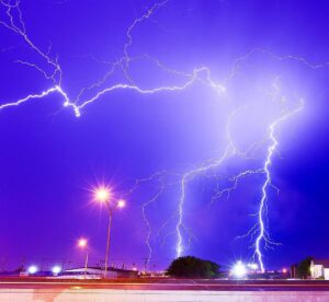 Mike Theiss Instagram - Intense supercell thunderstorm with multiple lightning bolts striking the ground at the same time in Kansas after a long day of storm chasing. The sound was so loud it left my ears ringing for over an hour. Lightning is a massive electrostatic discharge between the electrically charged regions within clouds or between a cloud and the surface of the planet. The charged regions within the atmosphere temporarily equalize themselves through a lightning flash, referred to as a "strike" if it hits an object on the ground. TAG someone you want to go storm chasing with. Photo by Mike Theiss @ExtremeNature