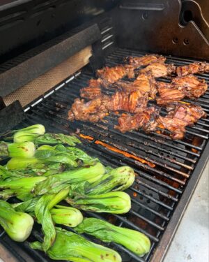 Ming Tsai Instagram - Asian BBQ Chicken Thighs with Charred Baby Bok Choy. Marinade: hoisin, tamari, garlic, ginger, red wine, salt, pepper and a little oil
