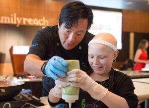 Ming Tsai Instagram - My next Cooking Live event with @familyreach is tomorrow, and I can’t help but take a stroll through memory lane and remember why I got started with such a great non-profit.

In 2010, my journey with Family Reach began when Executive Director Carla Tardif introduced me to Darlene, a young woman dying of osteosarcoma. One of Darlene’s last wishes was to come to Blue Ginger and eat a meal I cooked for her and her family. Without hesitation, I said yes. Fulfilling Darlene’s wish for a meal at Blue Ginger with her family and seeing the joy it brought them amidst their struggles was beyond moving.

Shortly after, Carla shared Raquel and Mikalo’s story. When Raquel’s son was diagnosed with cancer, she made the difficult decision to leave her job and support him through his treatment. As expenses piled up, they were eventually compelled to seek shelter in a homeless facility, where Mikalo continued his chemotherapy. The doctor emphasized the necessity of a bone marrow transplant for Mikalo’s survival. However, due to the shelter’s conditions, the procedure couldn’t be performed safely without a sterile environment post-transplant. Family Reach immediately stepped in, got them out of the homeless shelter and into their own apartment. Upon hearing this story, I knew I had to get involved and help beyond cooking a nice meal for families in the restaurant. That was 14 years ago and I haven’t looked back since.

Help me help @familyreach make a difference in so many families’ lives. Click the link in my bio to donate to Family Reach to help me reach my goal of raising $12 million! #dogood