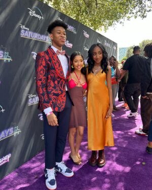 Mirabelle Lee Instagram - endlessly grateful for this cast and crew. becoming sonia was a dream. make sure you all watch the premiere of “saturdays” on march 24 on disney channel and next day on disney  ! 💜
-
styled by @ainynea 
dress by @nensidojaka 
makeup by @kymberberry 
hair by @tropixbraids 
nails by @jasmine_pronails 
-
#saturdaysseries #sonialittle