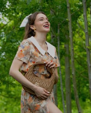 Miray Daner Instagram - Let’s go on a nature trip with @miumiu 🍃🪷 
#MiuMiu #MiuWander 👛 
#reklam