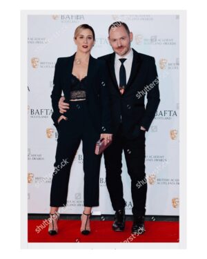 Morven Christie Instagram - #BAFTAScot18 last night, with @thecooksan (👑)who flew home from tour for less than 24hrs just to be my arm candy
❤️
Loved meeting @nicolasturgeon with Jude and Jack. 💙🏴󠁧󠁢󠁳󠁣󠁴󠁿💙
(Me styled by me, shoes and bag generously loaned by @louboutinworld 👠)
Thanks for having us @baftascotland (and for the nomination!) ✨