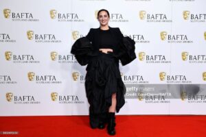 Morven Christie Instagram - Thank you for having me @baftascotland -a lovely night, a joy to be among so many great souls, and an honour to present the electric @gribbenlewis with his Best Actor award. 🖤

Special shoutout to Mason (final pic) who was out there alllllll day for pics and chats and who gave me a lovely cuddle when I came back down in my fancy garms ❤️

📸 @snapperjeff @carlopaloniphoto @euancherry @gettyentertainment