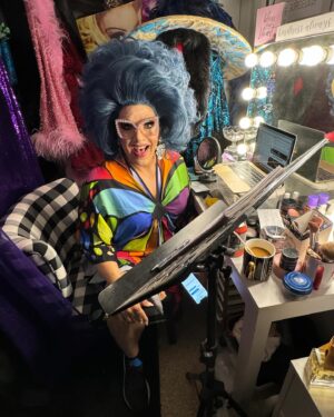 Mrs. Kasha Davis Instagram - This is LOVE! 🌈💋

Mr Davis @splevins on the floor of the drag room helping me with a virtual Drag BINGO!!!! 

#husbandsofinstagram #dragqueen #mrskashadavis