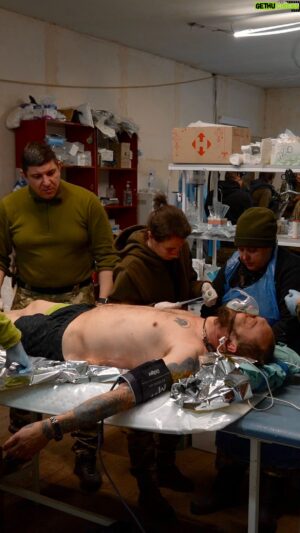 Mstyslav Chernov Instagram - In a field hospital treating wounded from the bloody battle in Bakhmut, battered, exhausted soldiers are brought in on stretchers, laid out on gurneys as the medical team triages their injuries and sends them off for further treatment or back to the front to continue fighting.

Chief of the medical service, Anatoliy, says his team treats dozens of soldiers every day and barely has time to eat.
“Medics work practically non-stop. Before the full-scale invasion, we had 50-60 wounded in a nine-month rotation, and now sometimes we have more (than this) in one day,” he said.

The fiercely contested city of Bakhmut has become a symbol of Ukrainian resistance as defenders hold out against Russia’s relentless shelling and heavy artillery aimed at securing Moscow’s stated aim of taking the whole of Donbas.

The scale of the human cost of the battle is evident from the mud-covered, broken bodies that constantly stream into the field hospital.

As more and more stretchers are brought into the makeshift operating theatre, medics swarm the injured, cutting off clothing and assessing the damage.

In one instance, they carefully remove a grenade from the pocket of a wounded soldier.
The work they do so near the front is not without risk.

On Saturday heavy shelling hit the hospital, injuring one of the doctors.
Laid out on a gurney, medics crowd around Ukrainian serviceman, Vitaliy who goes by the war name “Alpha”.

He groans in pain as medics work to try and treat the large deep wound on his arm.
“It was a tank shell,” Alpha says.

“They (Russians) tried to break through. But they failed. 

Despite the pain, he smiles and winks at one of the doctors.

Video by @mstyslav.chernov 

#ukraine #russia #invasion #war #medics #bakhmut #video #documentary #news #apnews #politics