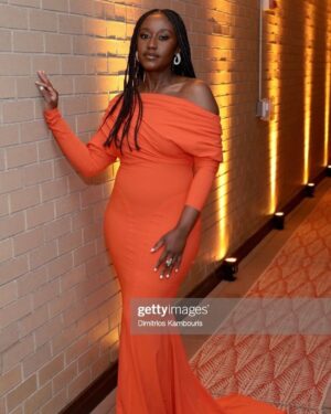 Nana Mensah Instagram - Thank you all for making #TheDiplomat number☝🏿on @netflix and giving me this excuse to post more pics of my premiere lewk! #styledbyzadrianandsarah 

Dress 🍊: @gretaconstantine 
Shoes: @stuartweitzman 
Bag: @jeffreylevinson 
Jewelry: @sterlingforever, @grazielagems 
Make Up: @billieegene
Hair: @braidzbyjadey as well as Selena at @hairbysusy using the wonderful product @rebundle.co 

📸 taken at Park Lane Hotel and the spectacular @civilianhotel rooftop