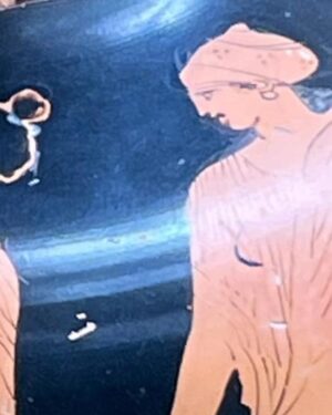 Natalie Haynes Instagram - What, Instagram, do we think is going on here? I love this girl biting her frock - or are they folding laundry? I  don’t think I have ever seen such a posture on another vase - it’s so funny and cute. Whatever they’re doing, she is flirting like crazy, because LOOK at that reaction shot behind her