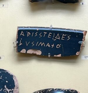 Natalie Haynes Instagram - Election day! At least, it is where I live.
And an opportunity to remember that people haven’t always voted FOR politicians; in 5th century BCE Athens, men (citizenship was restricted to adult male Athenians), could also vote AGAINST politicians or other noteworthy people. So if someone annoyed you, you could scratch his name onto a sherd of pottery (the Greek word for this is ostrakon - which is where our word ostracism comes from), and whoever got the most votes could be booted out of Athens for 10 years. There were some safeguards - a quorum of 6000 voters had to be present. 
But the system was set up to prevent demagoguery - as a general rule, anyone who has a high enough profile to affect democractic votes will also antagonise enough people to be at risk of ostracism. So unless your policies had a good impact quickly, you might be out on your ear. 
Here we can see lots of ostraka with names scratched on: Themistocles, Aristeides, Hippocrates and more.
I often find myself thinking that ostracism would be a good custom to revive, since it would really separate the popular politician from the ones who just shout culture war slogans. 
Happy voting!